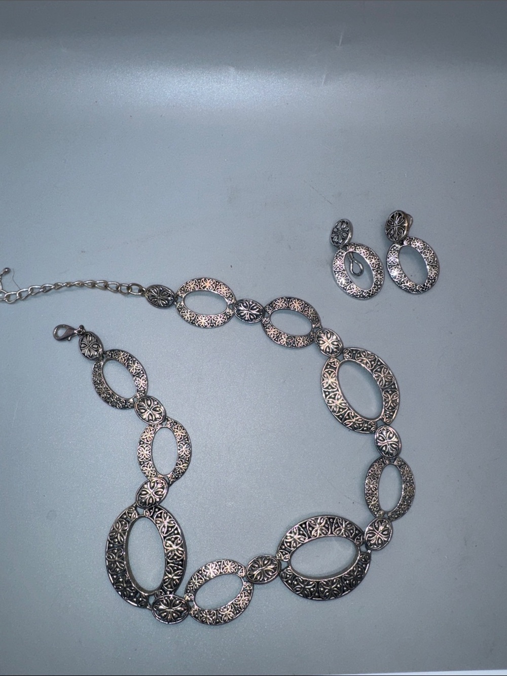 Intricate Silver-Tone Filigree Oval Necklace and Matching Earrings